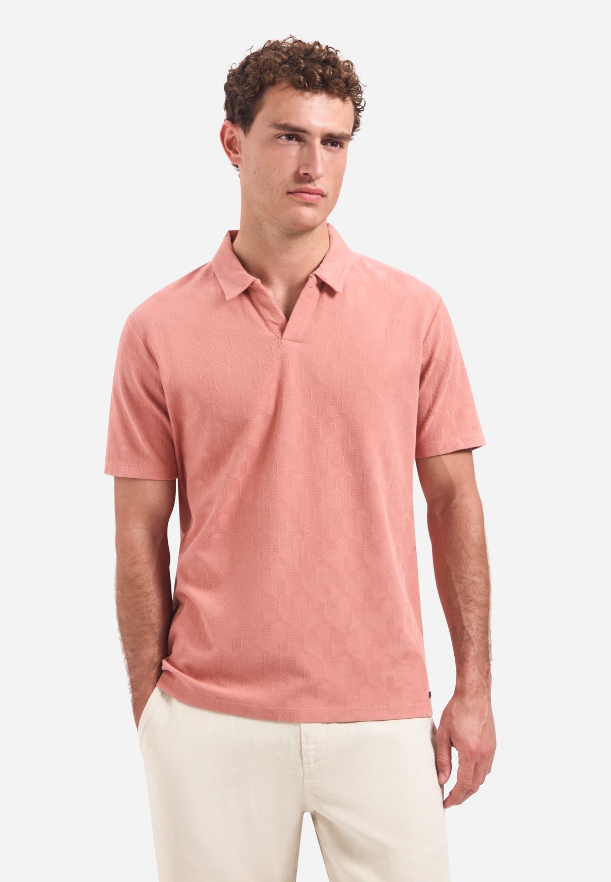 V-hals polo met korte mouwen en jacquardprint | Coral
