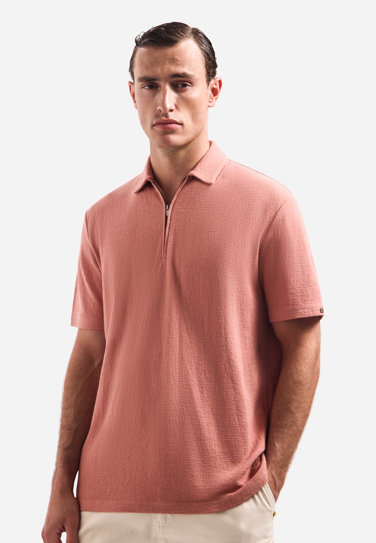 V-hals polo met korte mouwen en ritssluiting | Coral