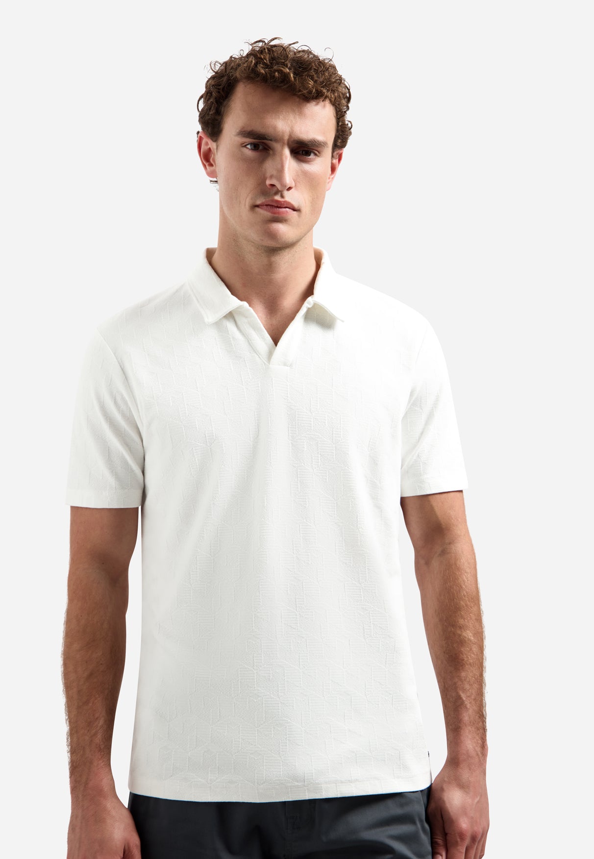 V-hals polo met korte mouwen en jacquardprint | Wit
