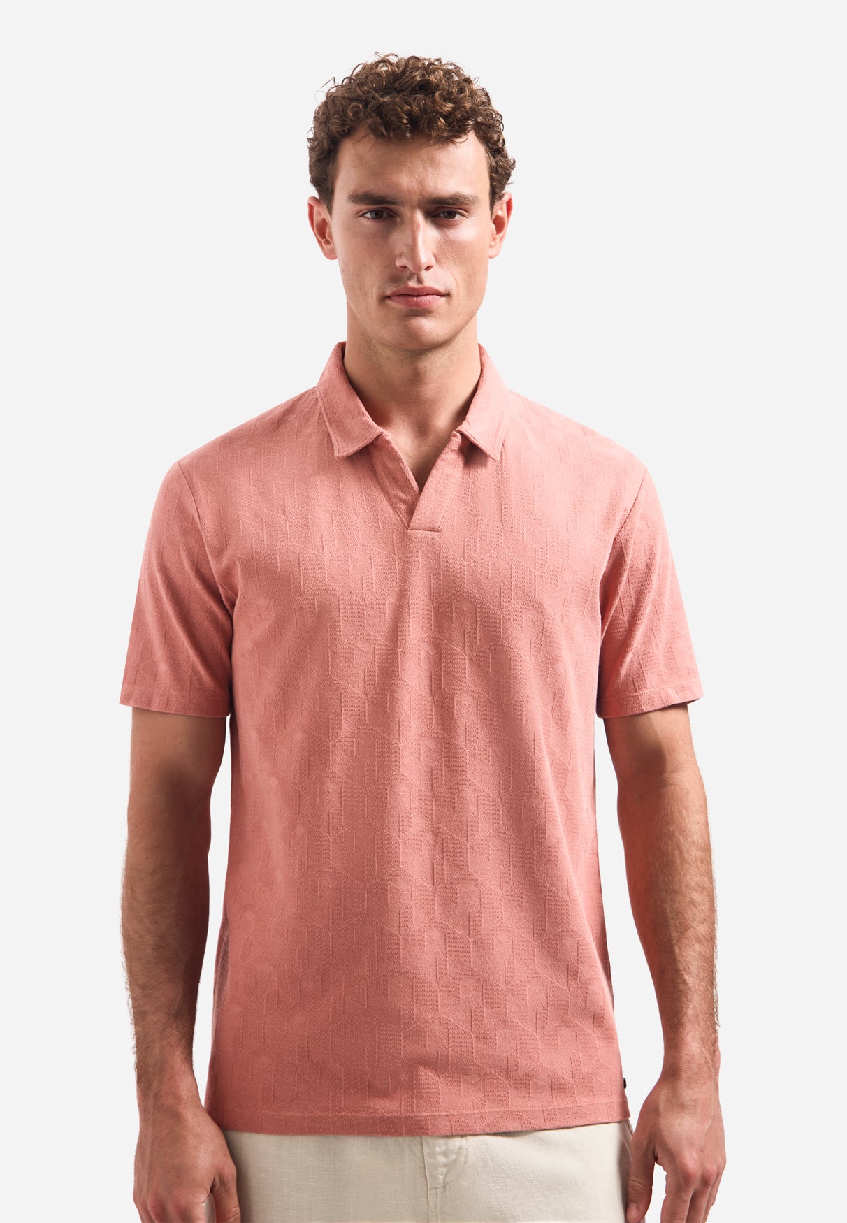 V-hals polo met korte mouwen en jacquardprint | Coral