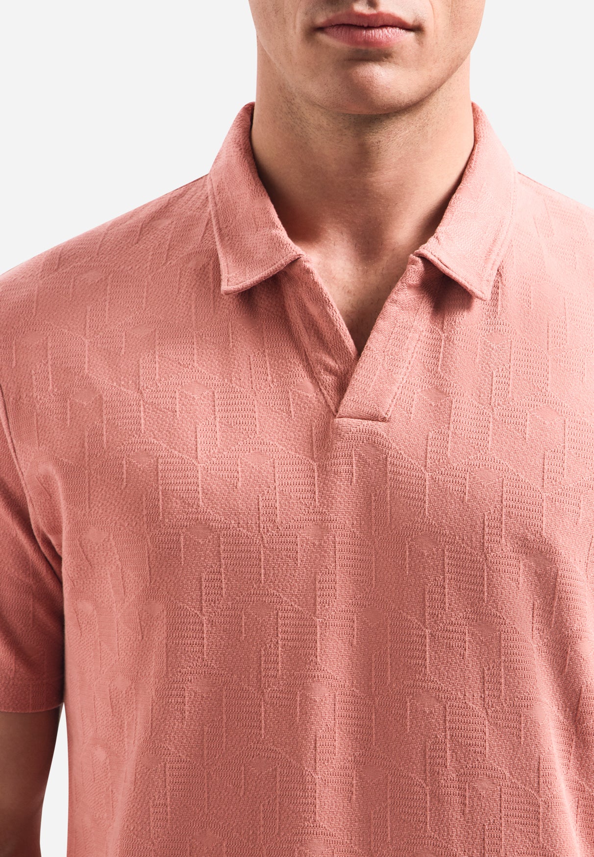 V-hals polo met korte mouwen en jacquardprint | Coral